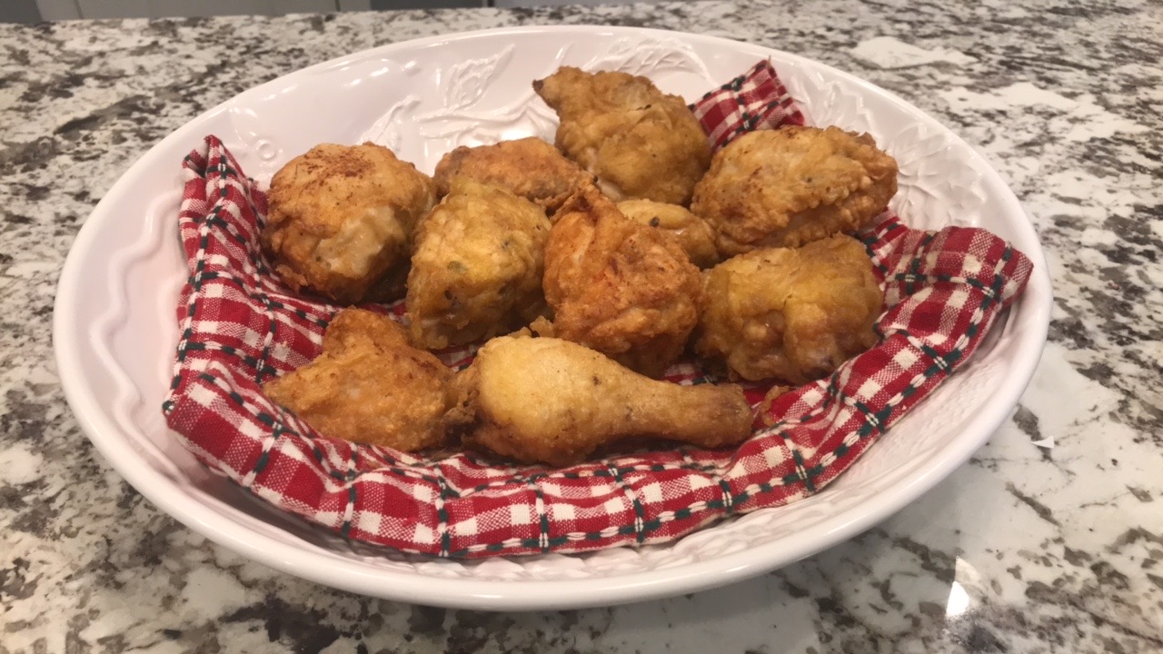 Bowl of crispy, golden brown fried chicken made Roman style.